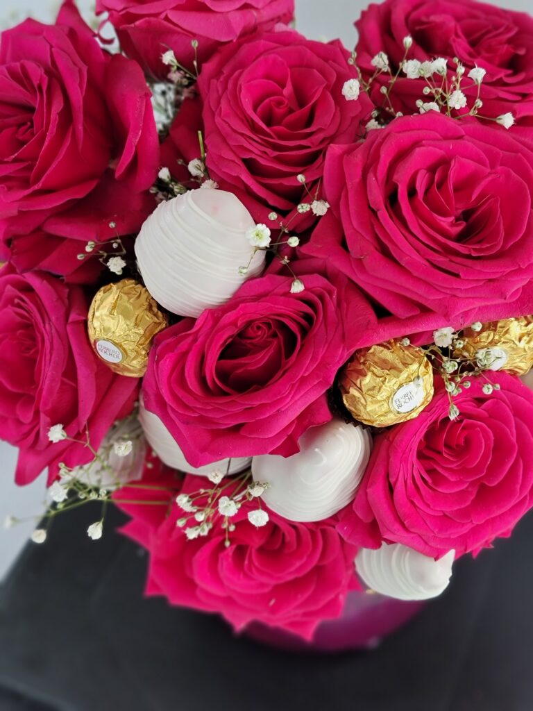 Luxe Berry Floral Bouquet. Strawberries dipped in chocolate, arranged with flowers.